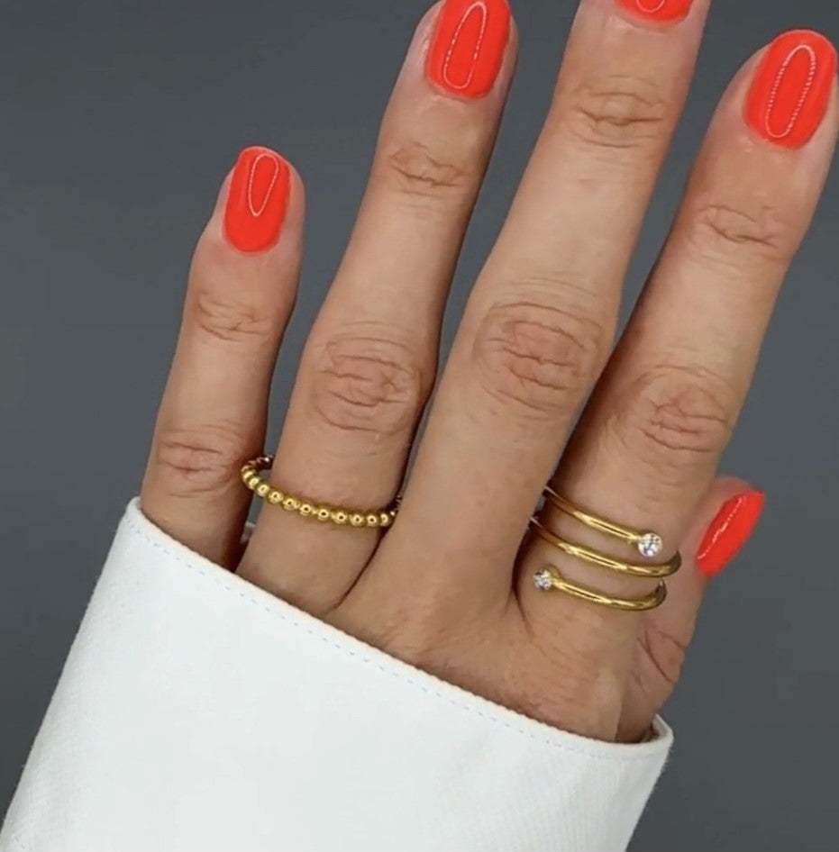 Sovereign Spiral modern gold wrap ring with dual crystal ends